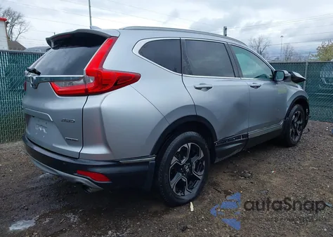 2017 Honda Cr-V Touring z USA, uszkodzony, nr VIN 5J6RW2H96HL019130